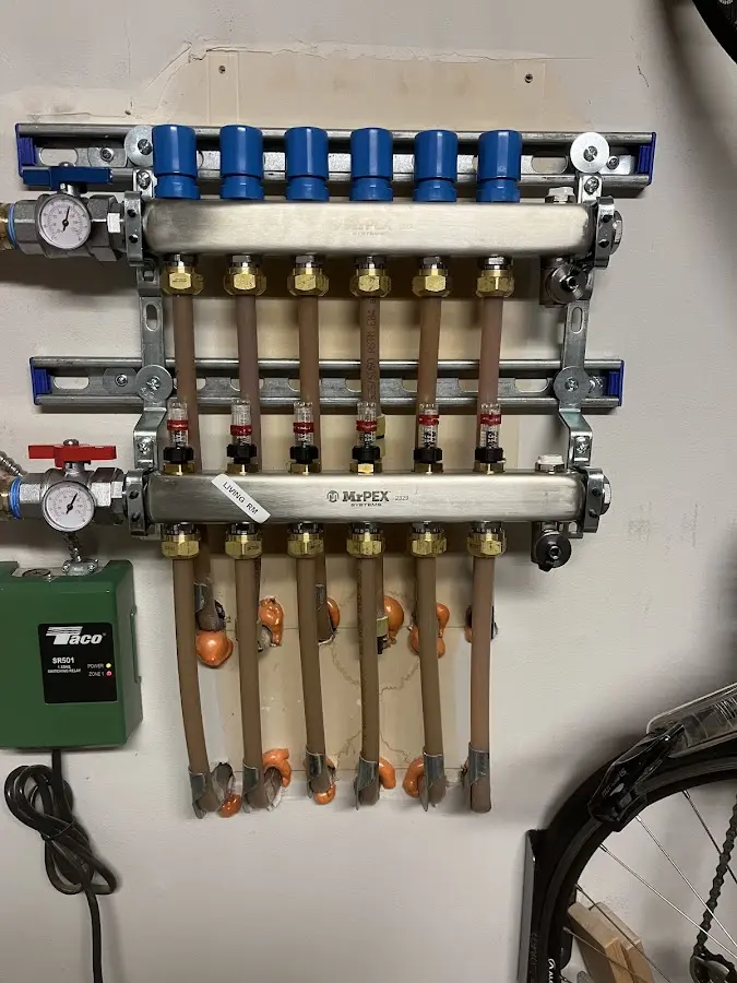 Plumber performing Water Heater Repair at a residential property in New Whiteland